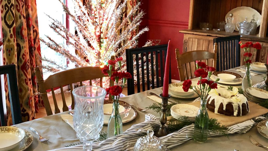 a red-themed table display for a baby shower in austin